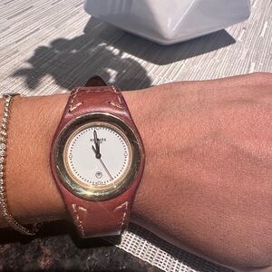 Beautiful Hermes watch RARE gold bezel.Fits 6-7 inch wrist.band has slight wear